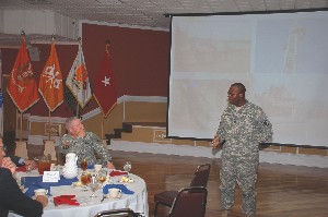 At the April membership luncheon meeting, Staff Sgt. Cedric Maybank, USA, recounts his recent operational experiences in theater.